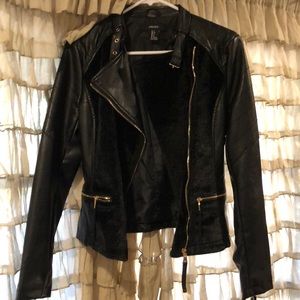 Leather jacket with fur detail